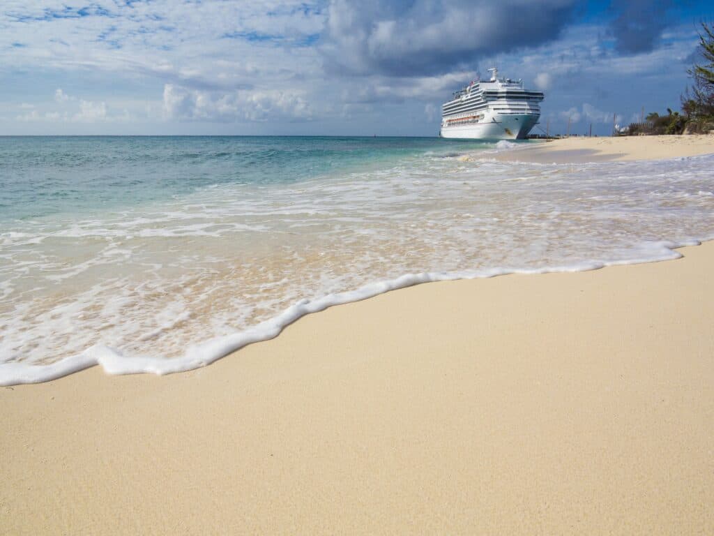 cruise-ship-docked-near-beach